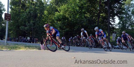 Alex takes the pack through a turn.