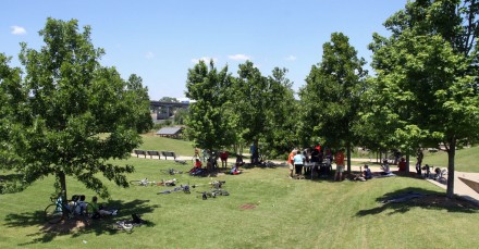 Picnic Riders find shade at the picnic.