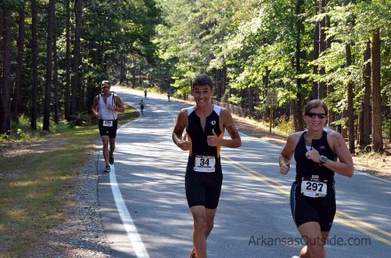 Athletes about to crest the last hill.