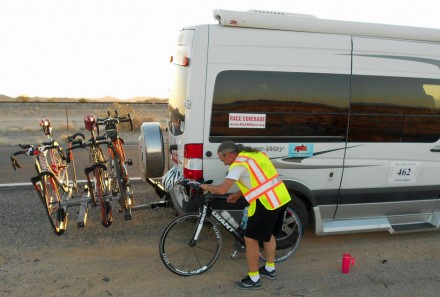 7450620662_276a12866e_b Follow crew checking the bike.