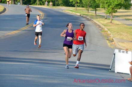 Women's overall winner, Tracy Tungac of Bryant, AR, sprinting into the finish.