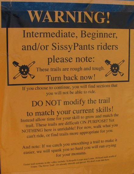 A proper and complete warning sign.