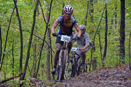 Cat 2 Mountain Bikers Category Two Racers topping a hill on the beautifully cut trail.