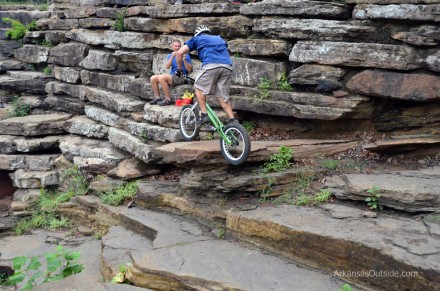 Trials Trials riders working the CCC dam at Devil's Den State Park.