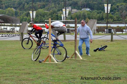2012-10-06_1472 Of course someone had to attempt to limbo on a tall bike. She almost made it.