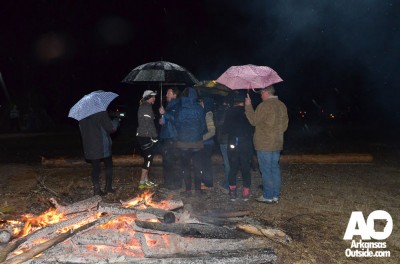 Volunteers, fans and team members took advantage of one of two bonfires to keep warm.