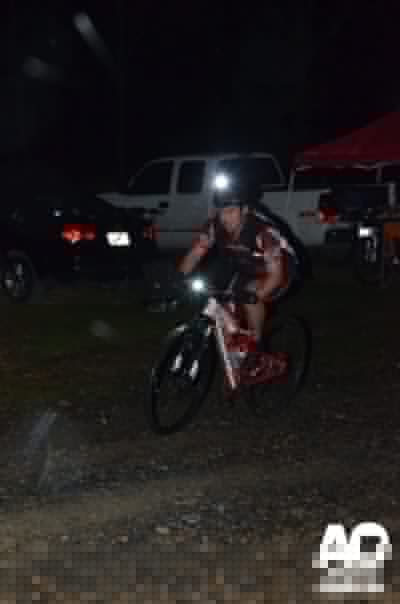 One racer coming in off the mountain bike leg, it was wet out there.