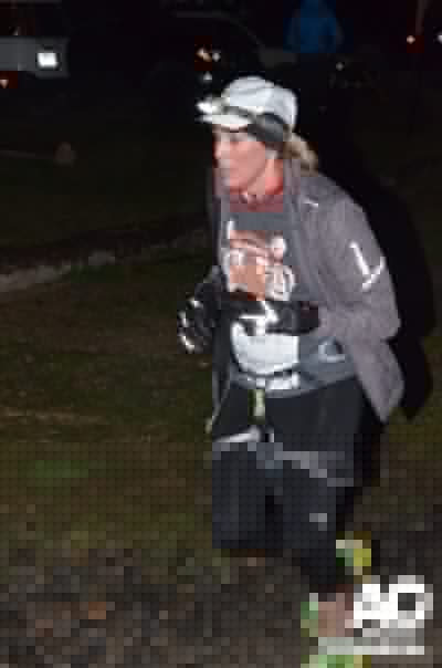 A runner completing the final run before a final climb.