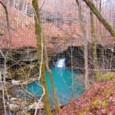 Bear Creek flows into a deep-blue rock pool several miles southwest of Pelsor, Ark.
