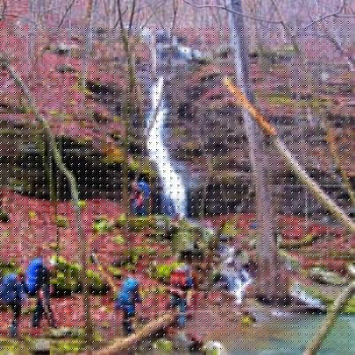Hikers equipped for a rainy excursion explore Bear Creek Canyon during a trip led by Dan Nash.