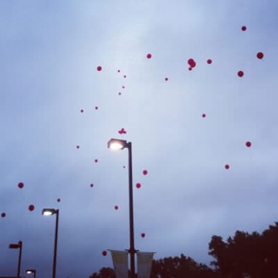 Red balloons were released in honor of cancer survivors and those whom we lost