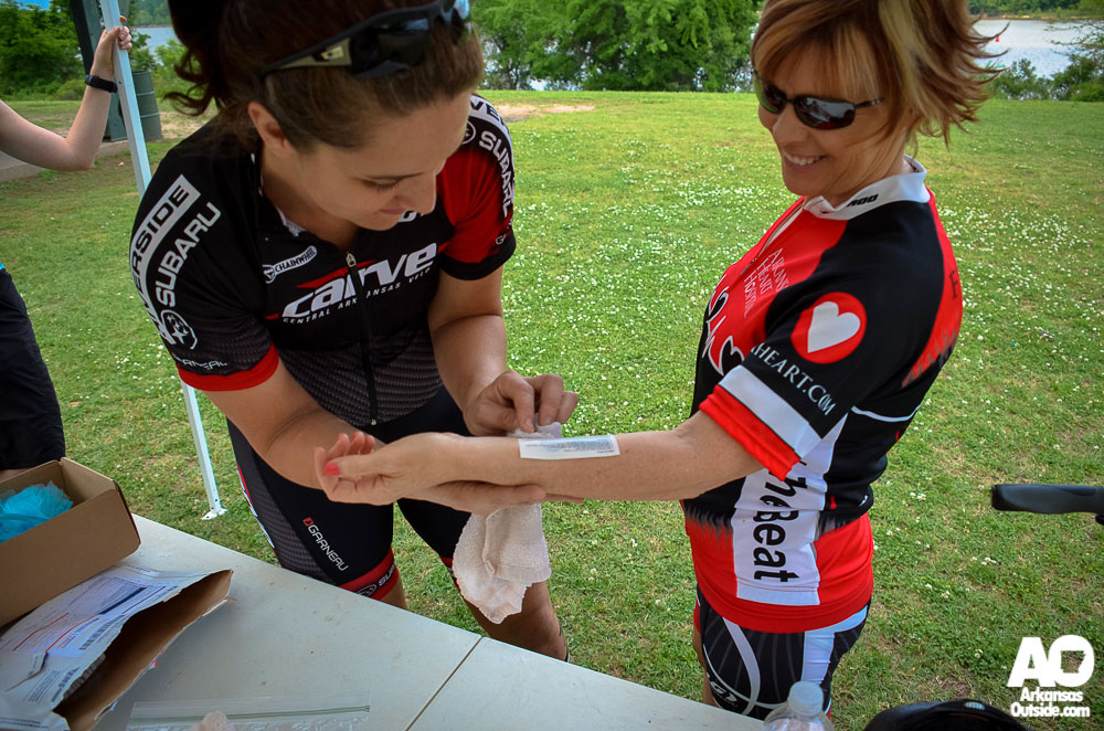 Helping with temporary tattoos at Central Arkansas Cyclofemme 2014.