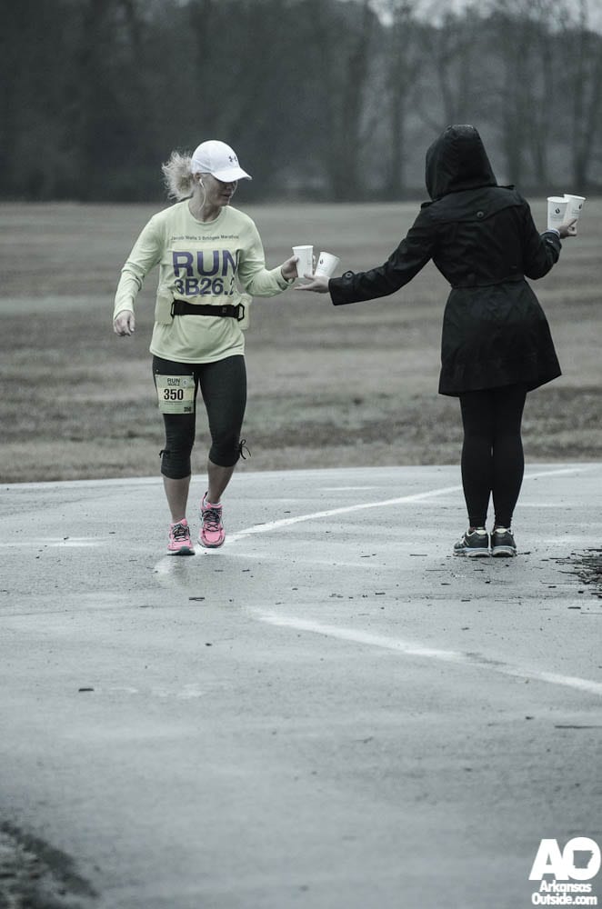 Christine services a runner.