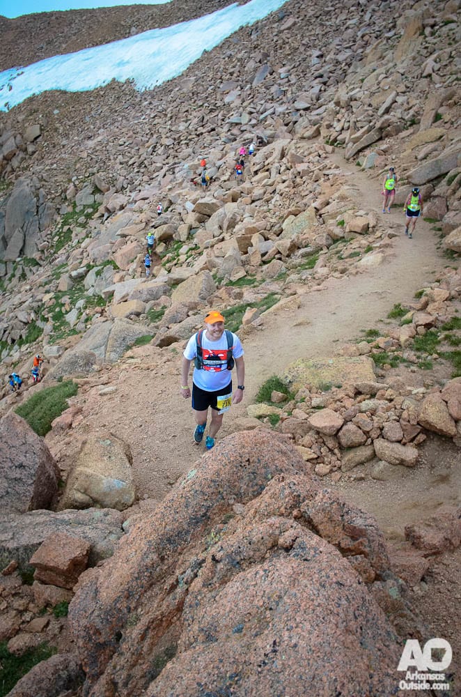 Justin Cloar hits another switchback in front of us.