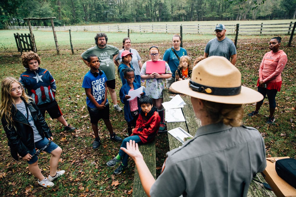 Students from Bentonville prepare to enter the historic Boxley Grist Mill. Photo: Terra Fondriest