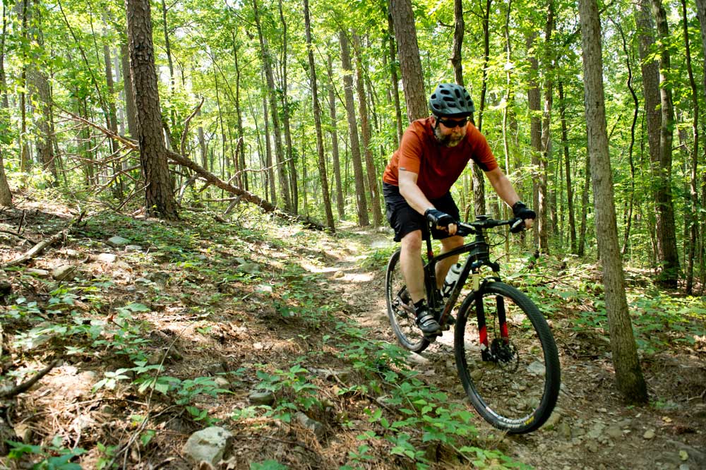 Riding the challenging Earthquake Ridge Trails.