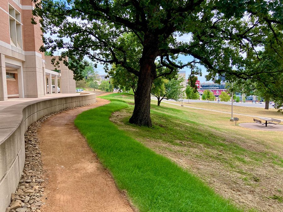 The traverse loop will connect the campus to numerous parks and trails throughout Fayetteville and is expected to open in August.