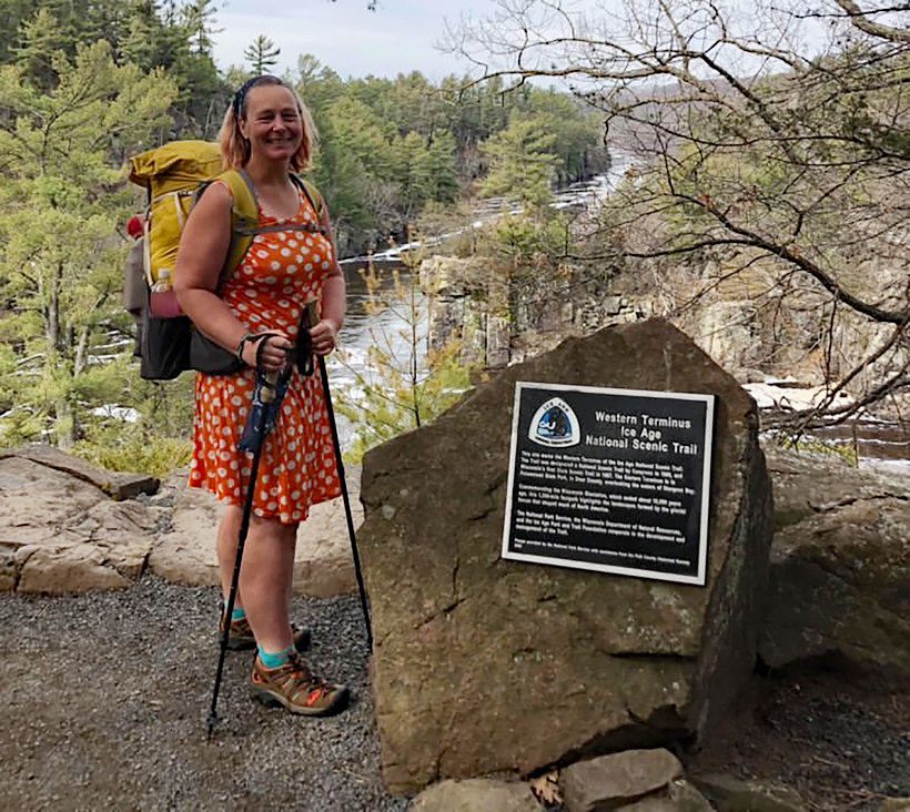 Arlette Laan stands at the Ice Age Trail's western terminus. Once she reaches the trail's eastern terminus, she'll be the first woman to hike all 11 national scenic trails. Photo courtesy of Arlette Laan