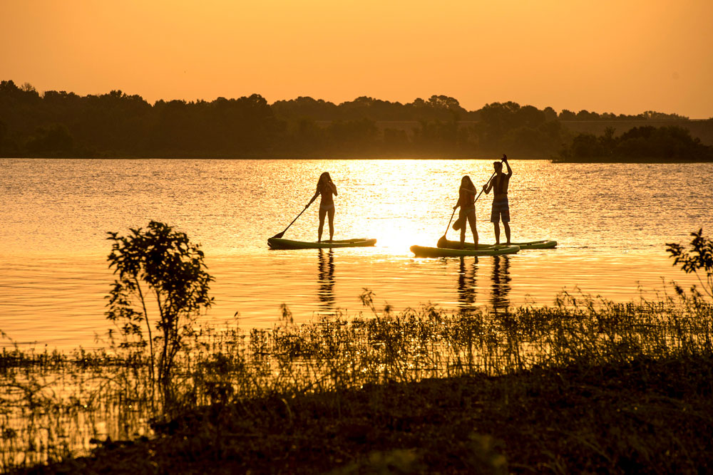 Paddleboarding on Arkansas lakes is an excellent Summer activity.